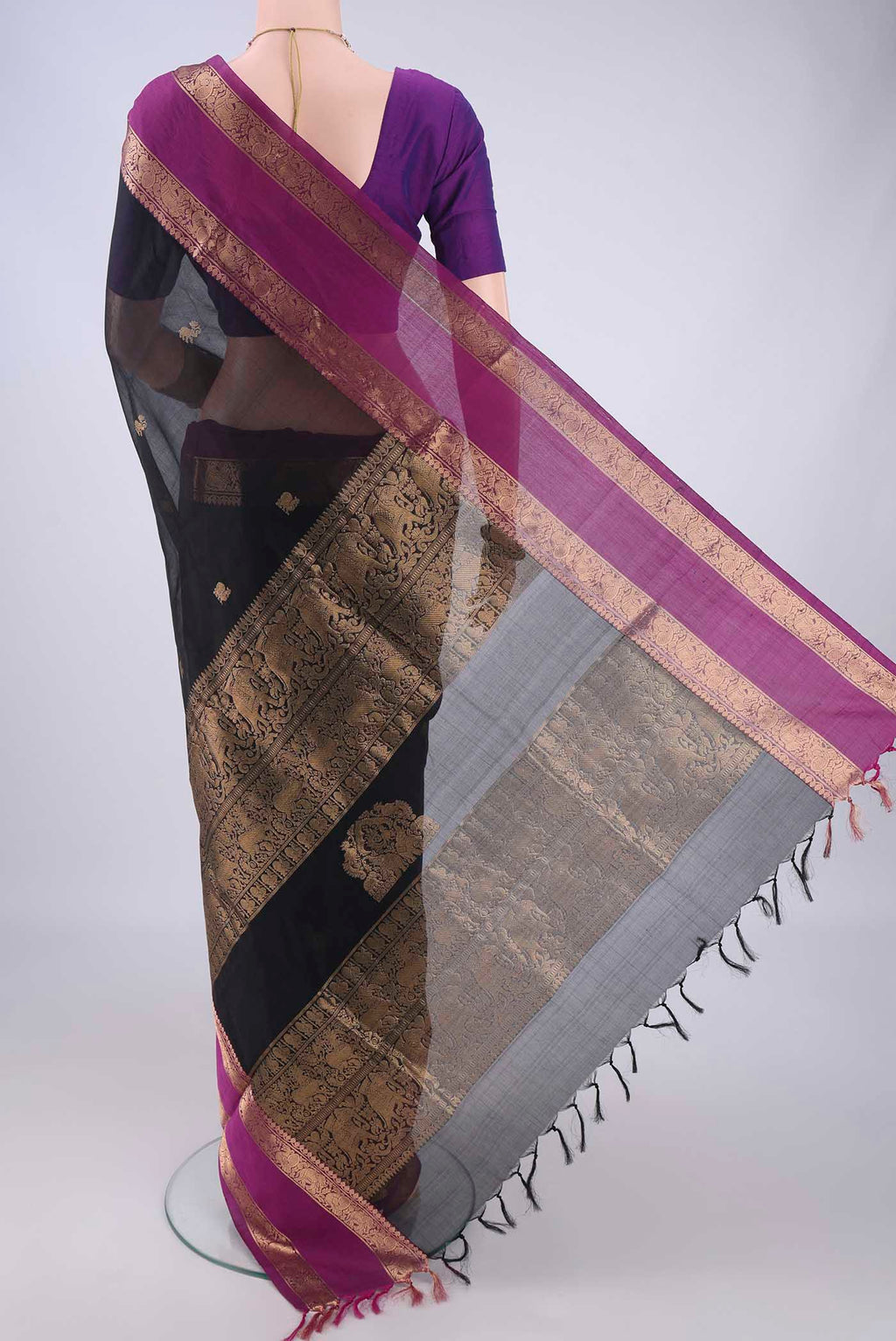 Flat view of Black Coimbatore Silk Cotton Saree with Zari Butta on the body and Zari Border. 