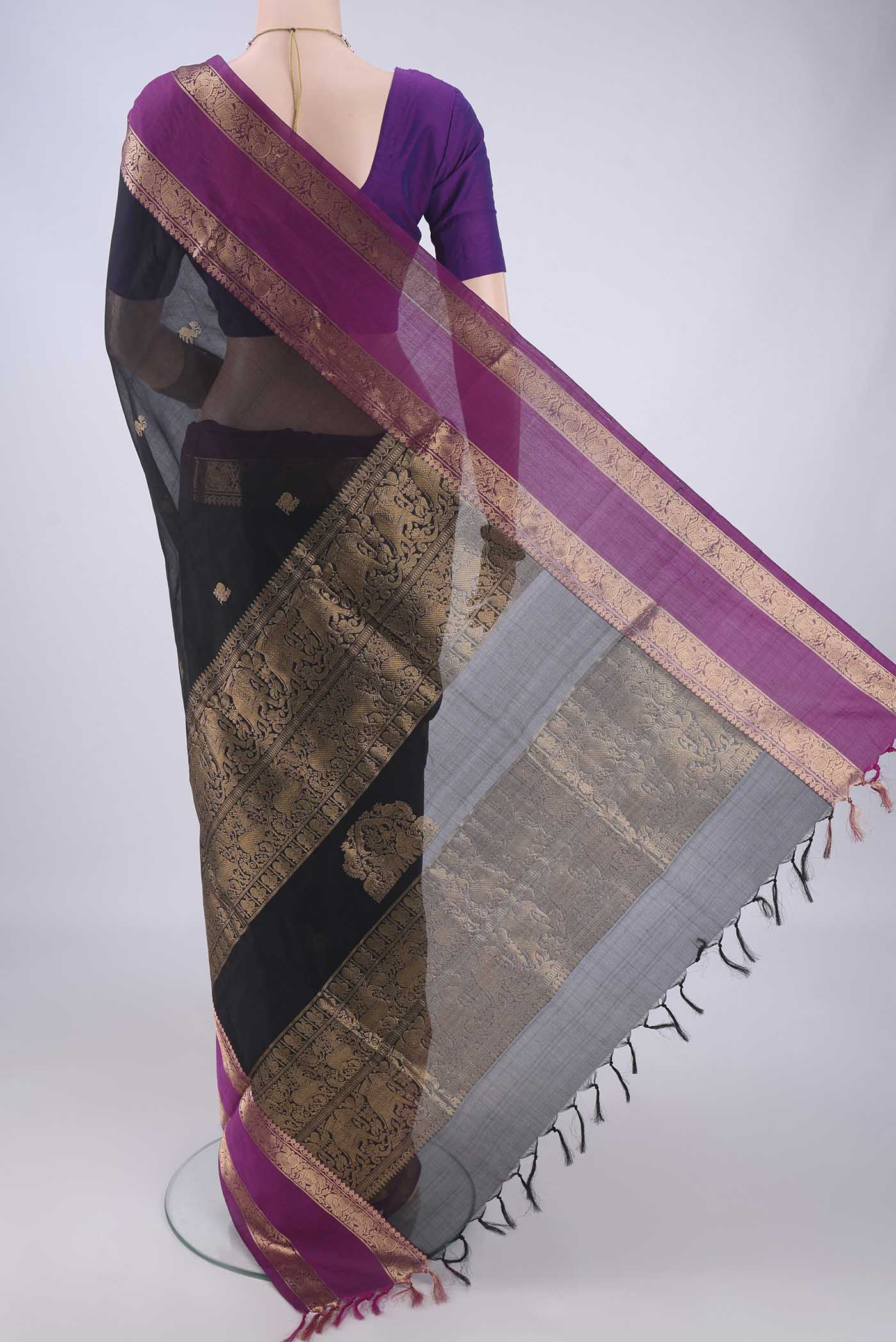 Flat view of Black Coimbatore Silk Cotton Saree with Zari Butta on the body and Zari Border. 