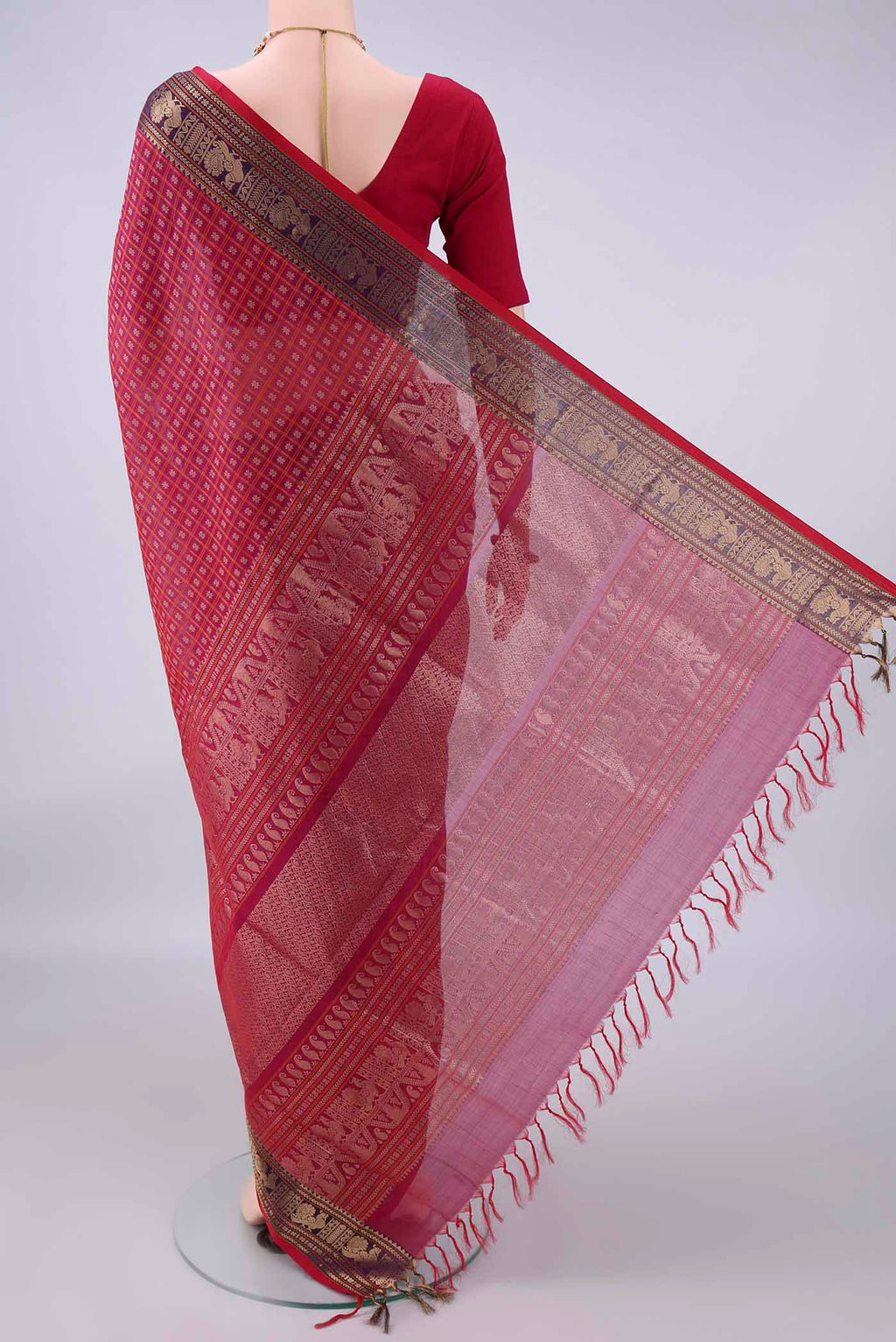 Flat view of Red Coimbatore Cotton Saree with Checked design on the body and Zari Border. 