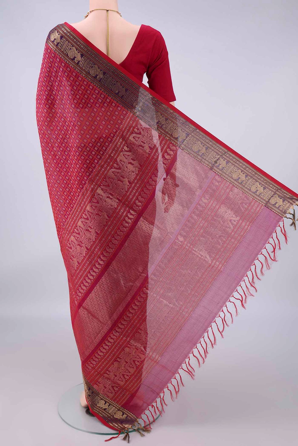 Flat view of Red Coimbatore Cotton Saree with Checked design on the body and Zari Border. 
