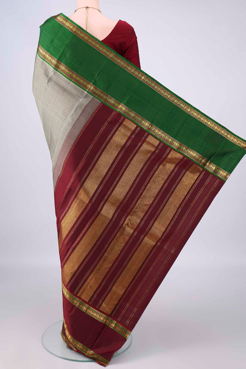 Flat view of Pure Silk Grey Kanchipuram Saree with Checked design on the body and Ganga Jamuna Border. 