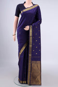 Pure Silk Navy Blue Kanchipuram Saree with Zari Butta on the body and Zari Border.  displayed on a mannequin