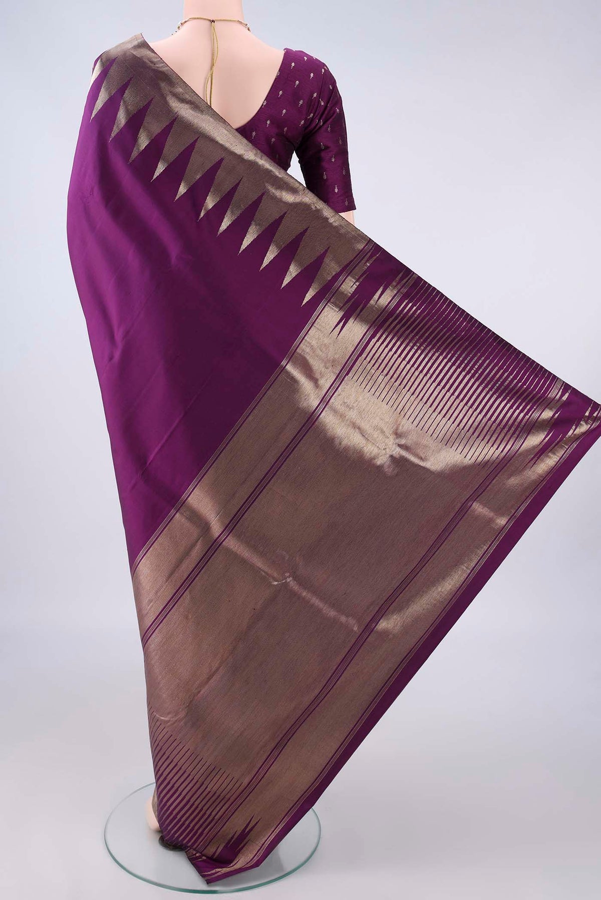 Flat view of Pure Silk Purple Kanjivaram Saree with Plain Body and Temple Border. 