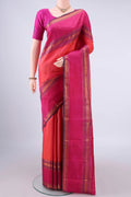 Pure Silk Orange Kanjivaram Saree with Zari Butta on the body and Zari Border.  displayed on a mannequin