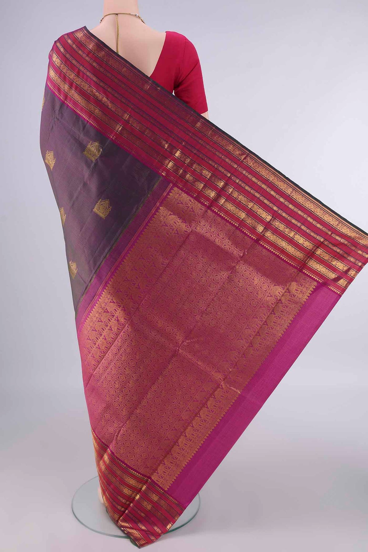 Flat view of Pure Silk Purple Dual Tone Kanjivaram Saree with Zari Butta on the body and Zari Border. 