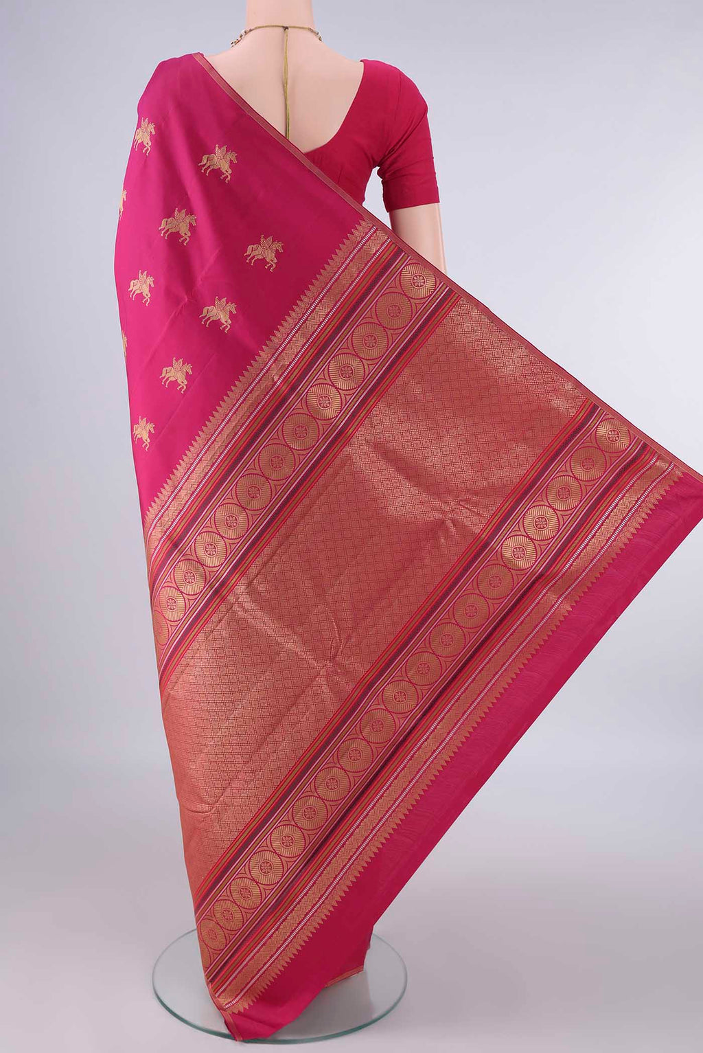Flat view of Pure Silk Rani Pink Kanjivaram Saree with Thread Butta on the body and Plain Border. 