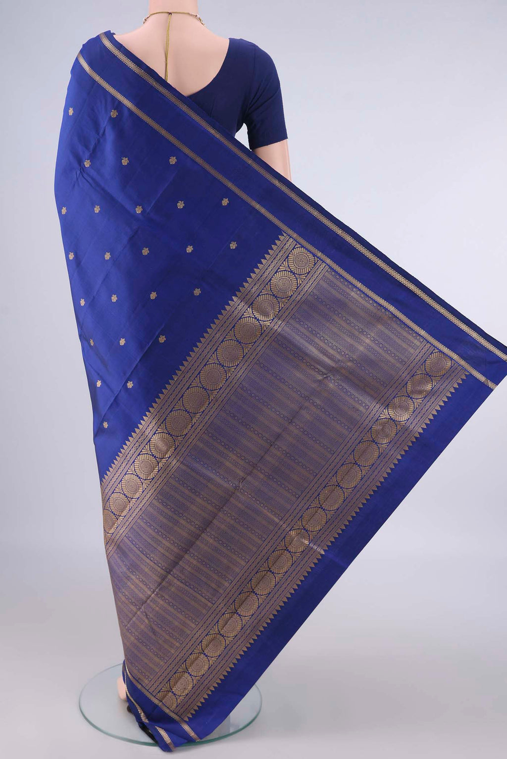 Flat view of Pure Silk Royal Blue Kanjivaram Saree with Thread Butta on the body and Thread Border. 