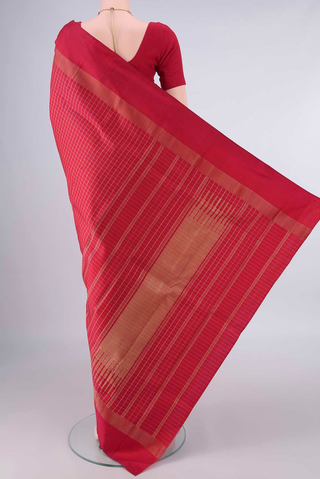Flat view of Pure Silk Red Kanjivaram Saree with Checked design on the body and Zari Border. 