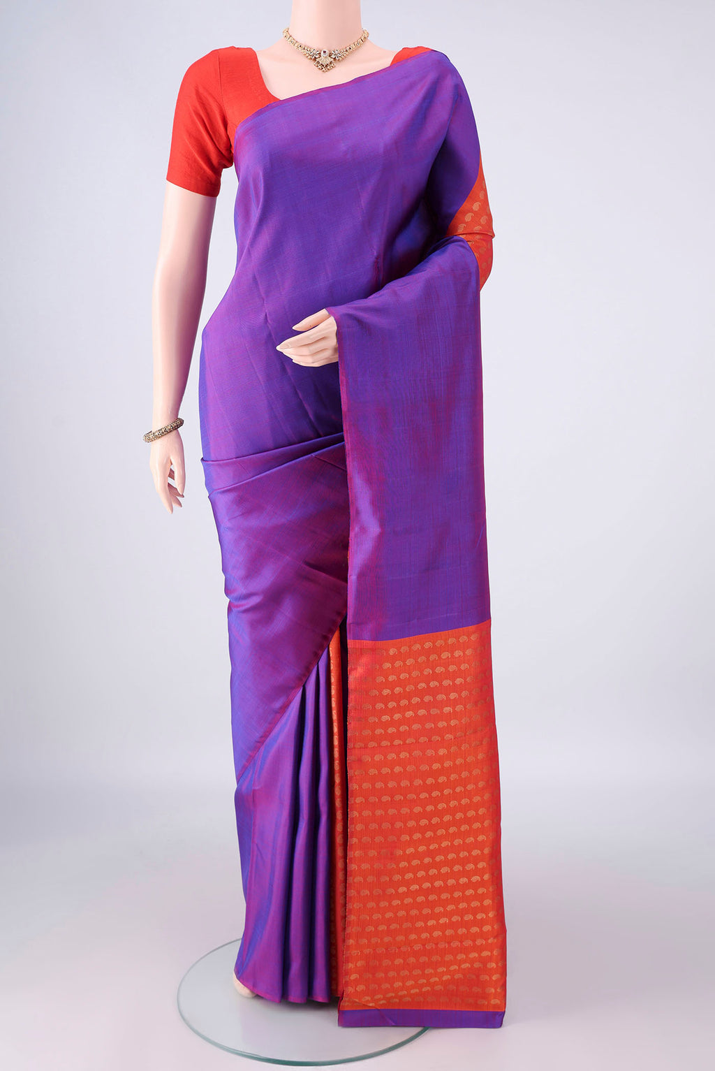 Pure Silk Pure Zari Multi Color Kanchipuram Saree with Half And Half on the body and Without Border.  displayed on a mannequin