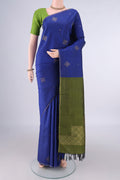 Pure Silk Blue Kanchipuram Saree with Zari Butta on the body and Thin Zari Line.  displayed on a mannequin