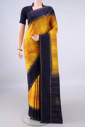 Pure Silk Yellow Kanjivaram Saree with Checked design on the body and Zari Border.  displayed on a mannequin
