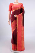 Pure Silk Maroon Kanjivaram Saree with Zari Butta on the body and Zari Border.  displayed on a mannequin