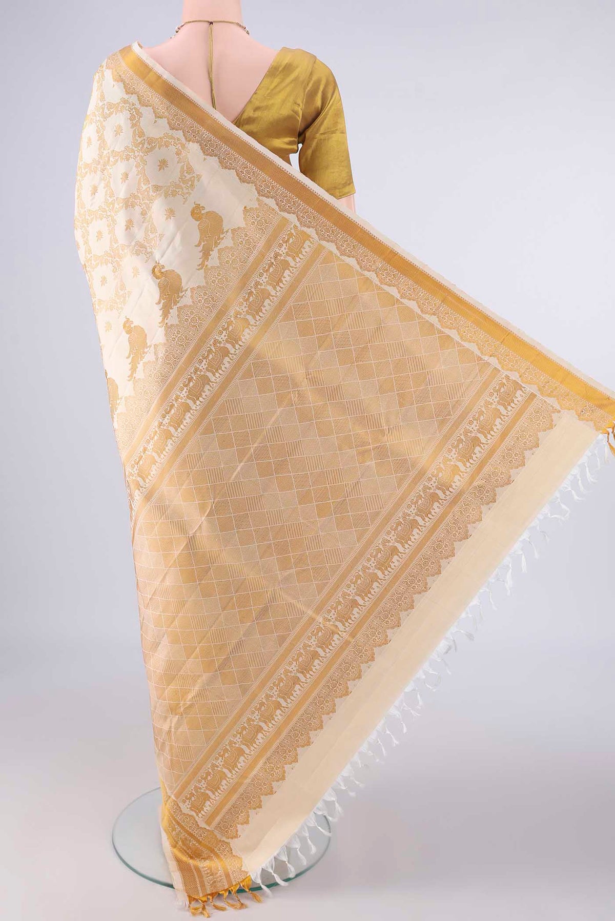 Flat view of Pure Silk Cream Kanjivaram Saree with Thread Brocade on the body and Thread Border. 