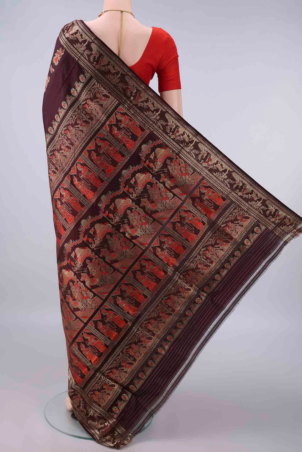 Flat view of Pure Silk Coffee Brown Baluchari Saree with Zari And Thread Butta on the body and Zari Border. 