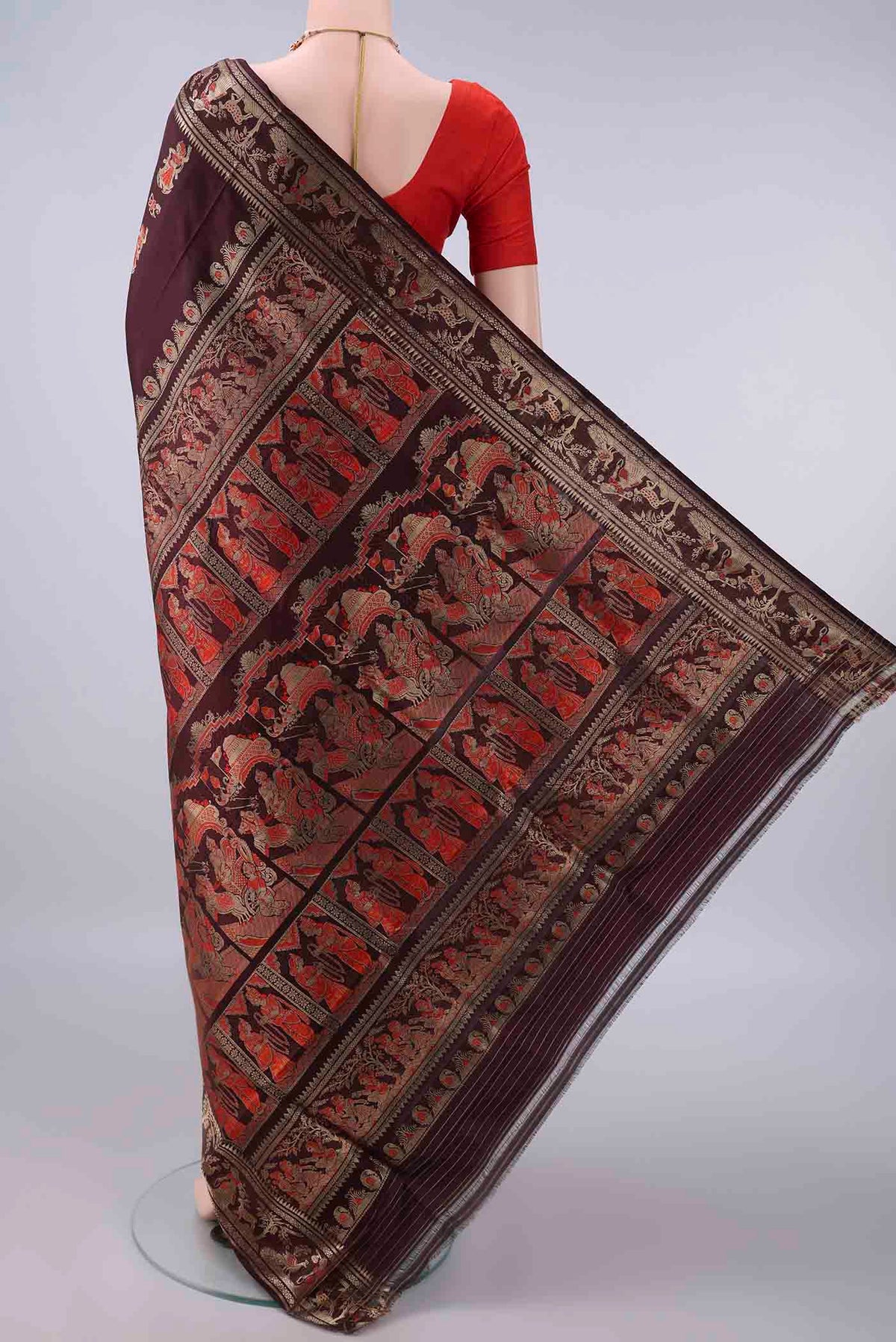 Flat view of Pure Silk Coffee Brown Baluchari Saree with Zari And Thread Butta on the body and Zari Border. 