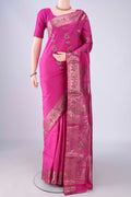 Rani Pink Dual Tone Baluchari Silk Saree with Zari And Thread Butta on the body and Zari And Thread Border.  displayed on a mannequin