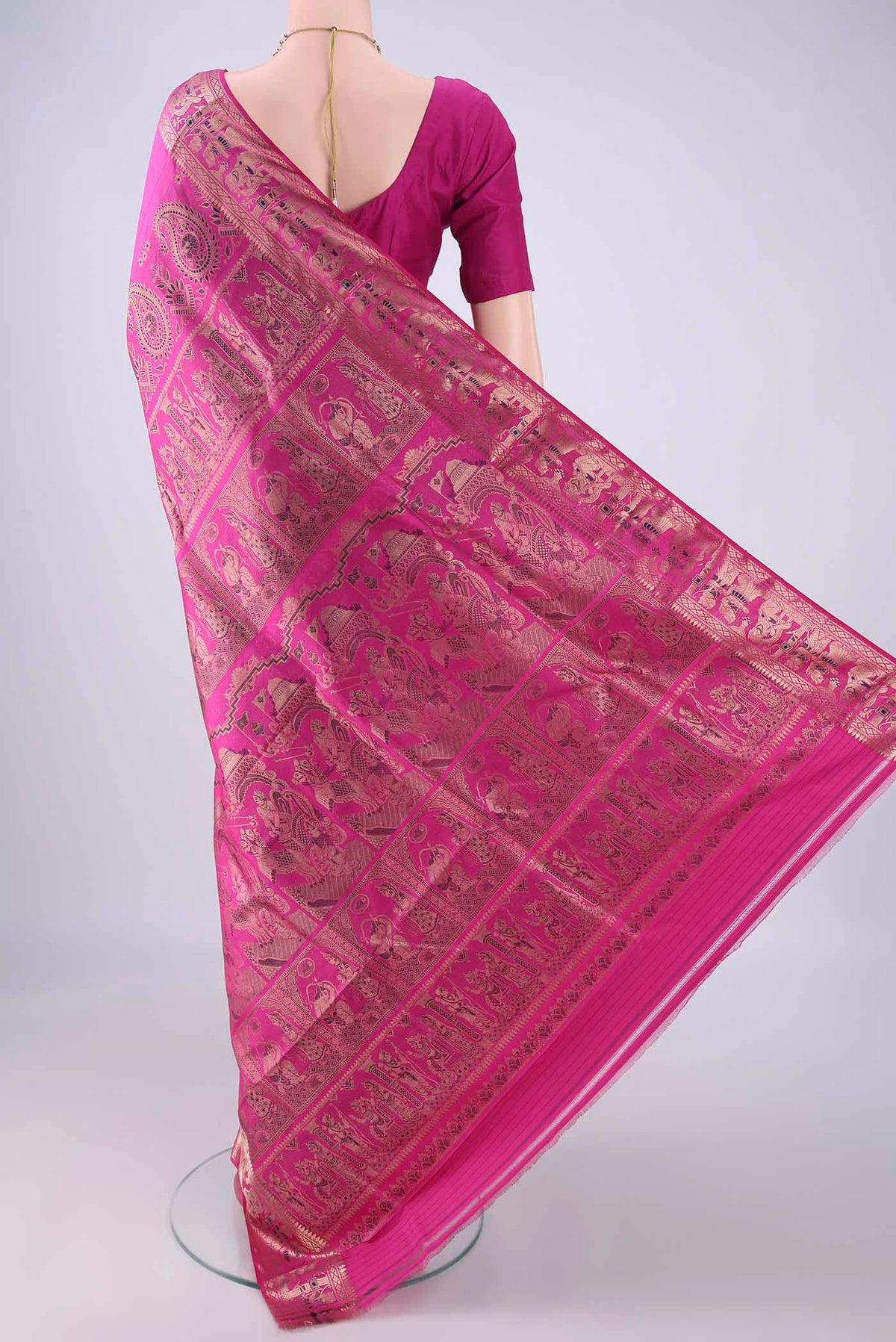 Flat view of Rani Pink Dual Tone Baluchari Silk Saree with Zari And Thread Butta on the body and Zari And Thread Border. 
