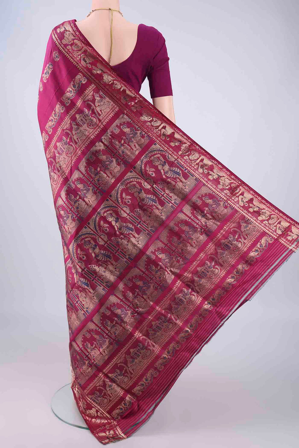 Flat view of Magenta Baluchari Silk Saree with Zari And Thread Butta on the body and Zari And Thread Border. 