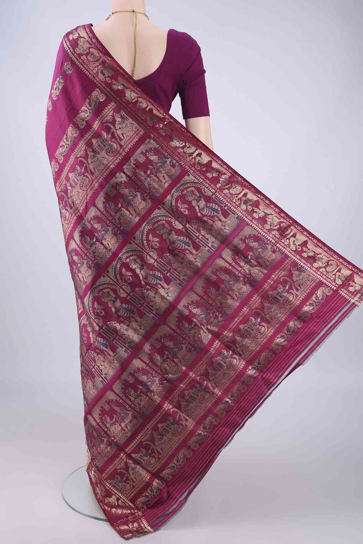 Flat view of Magenta Baluchari Silk Saree with Zari And Thread Butta on the body and Zari And Thread Border. 
