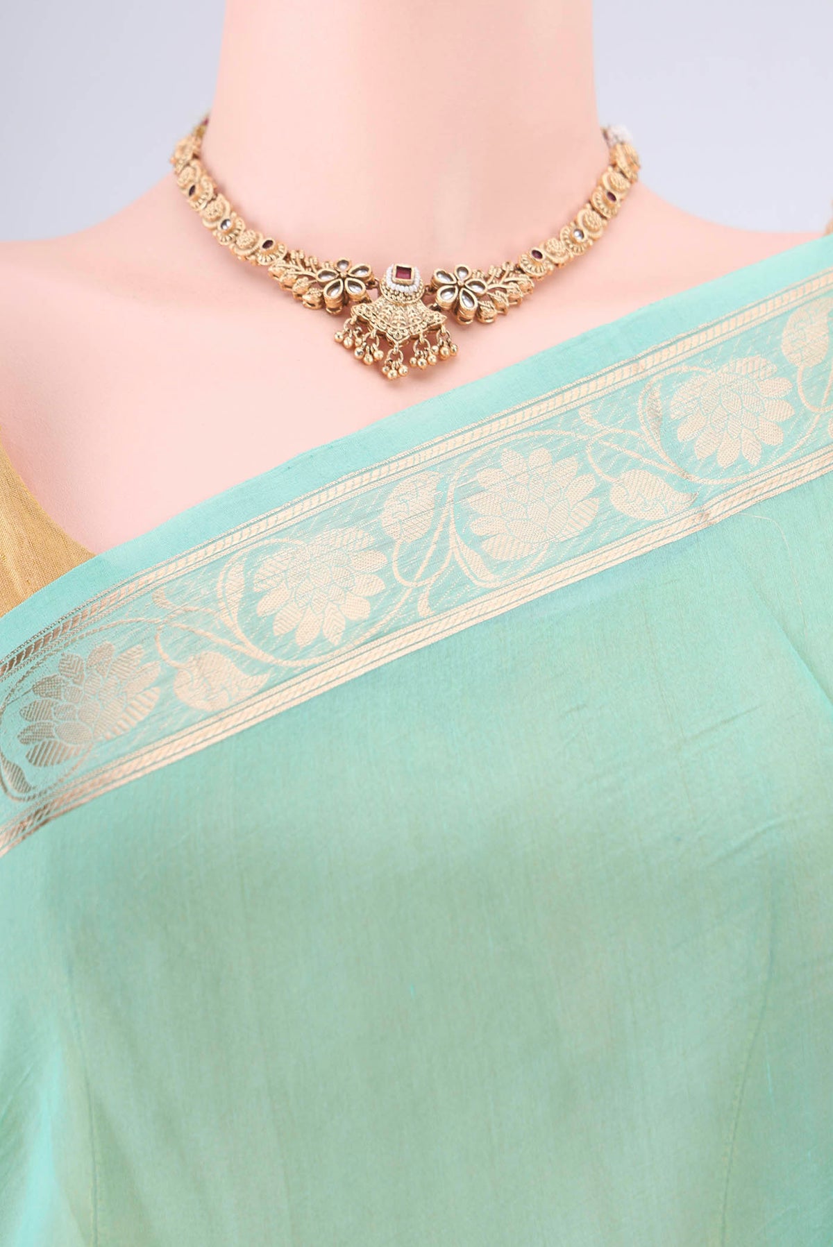 Border image of Sea Green Organza Saree with Zari Butta on the body and Zari Border. 