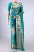 Blue Dual Tone Kanjivaram Silk Saree with Zari Brocade on the body and Zari Border.  displayed on a mannequin