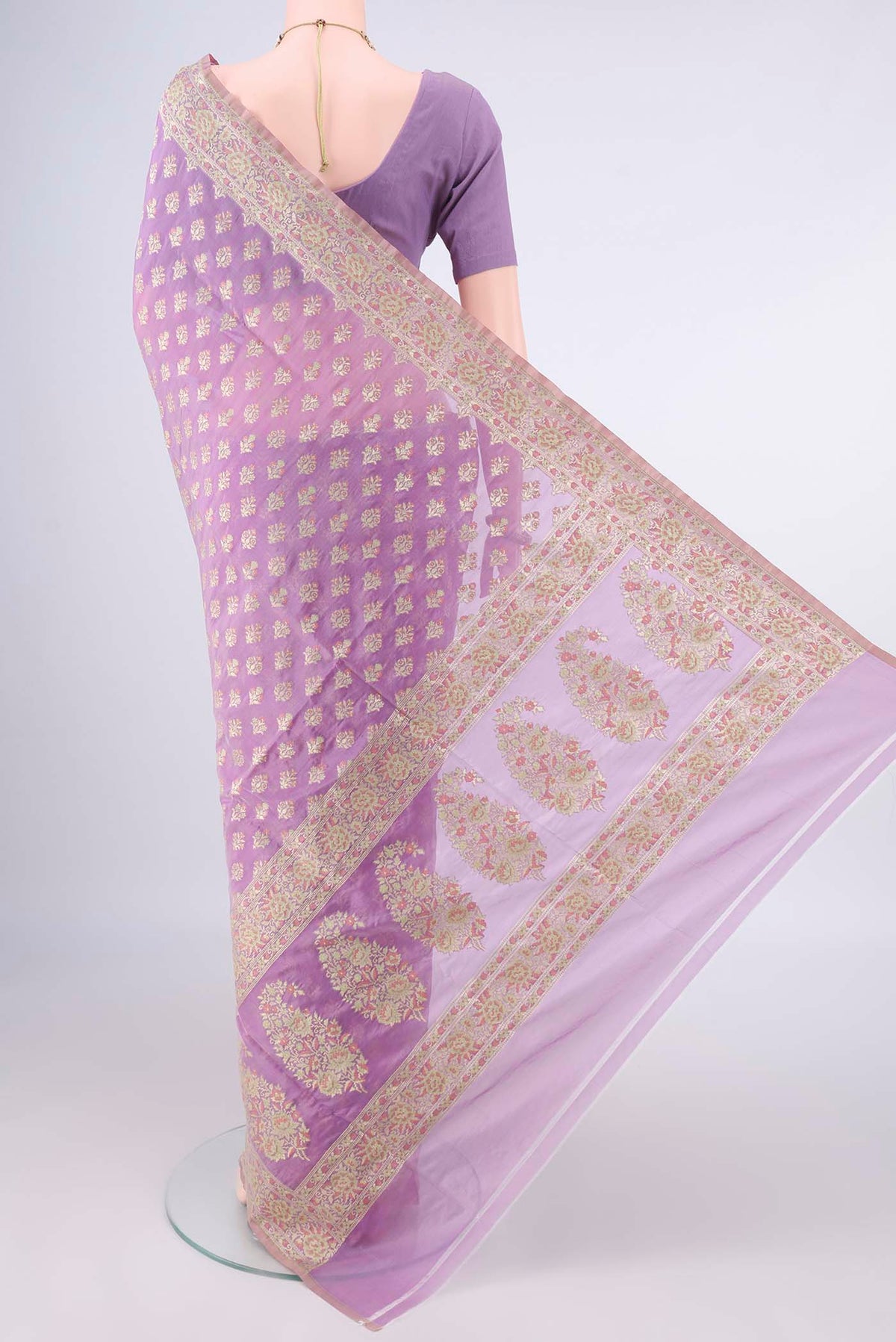 Flat view of Pure Silk Lavender Banarasi Saree with Zari And Thread Butta on the body and Zari Border. 