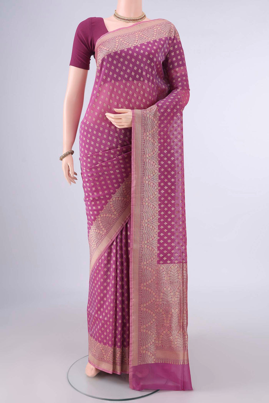 Pure Silk Light Magenta Banarasi Saree with Zari And Thread Butta on the body and Zari And Thread Border.  displayed on a mannequin