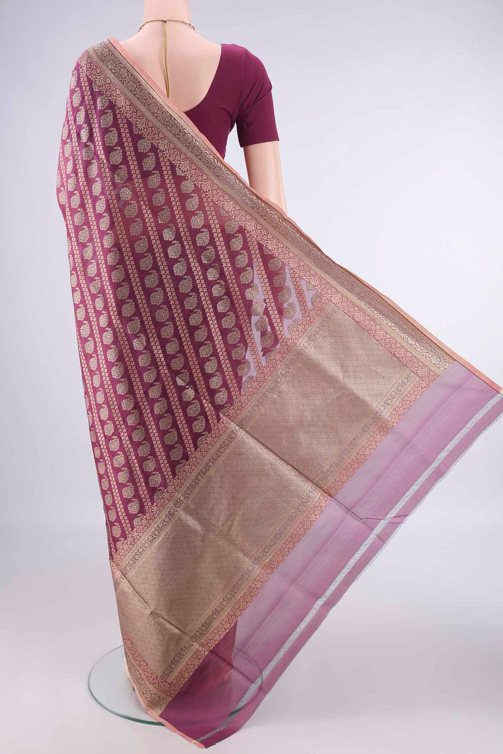 Flat view of Pure Silk Dark Mauve Banarasi Saree with Zari And Thread Butta on the body and Zari Border. 