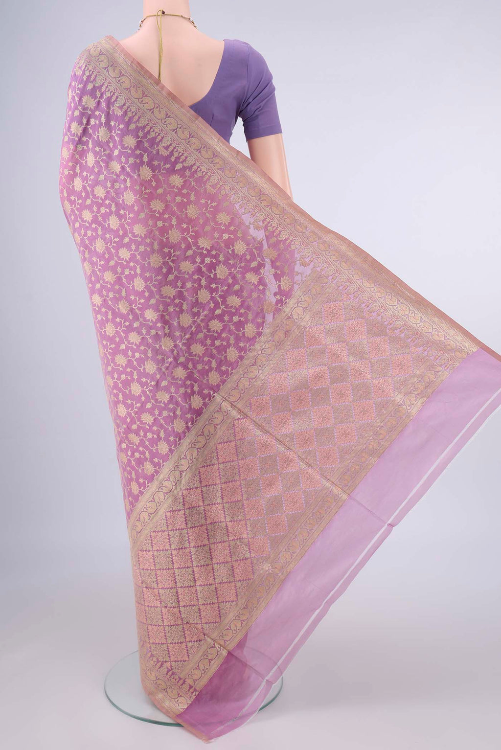 Flat view of Pure Silk Rose Gold Banarasi Saree with Thread Brocade on the body and Zari Border. 