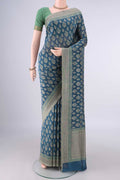 Pure Silk Blue Banarasi Saree with Thread Brocade on the body and Thread Border.  displayed on a mannequin