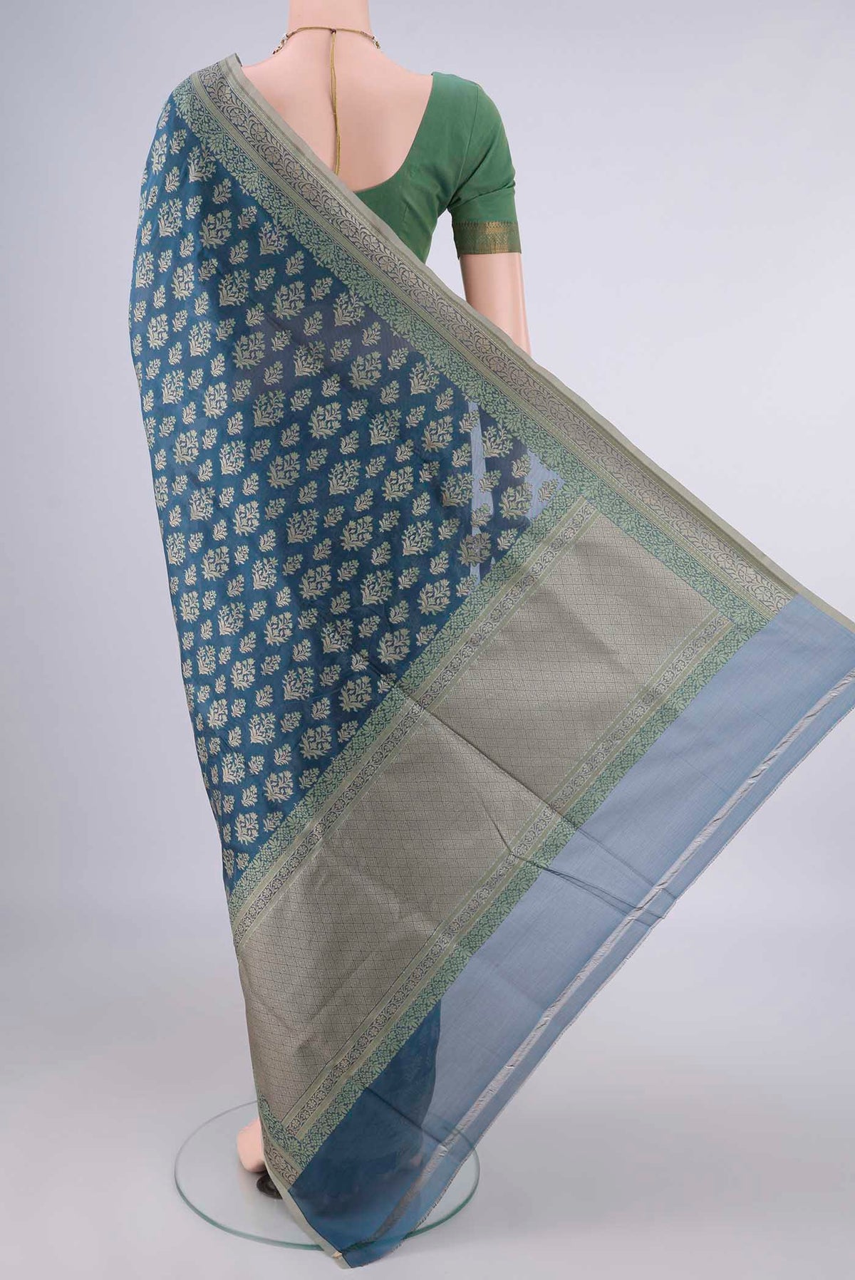 Flat view of Pure Silk Blue Banarasi Saree with Thread Brocade on the body and Thread Border. 