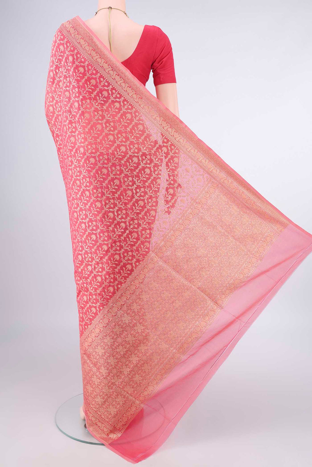 Flat view of Pure Silk Peach Banarasi Saree with Zari And Thread Butta on the body and Zari Border. 