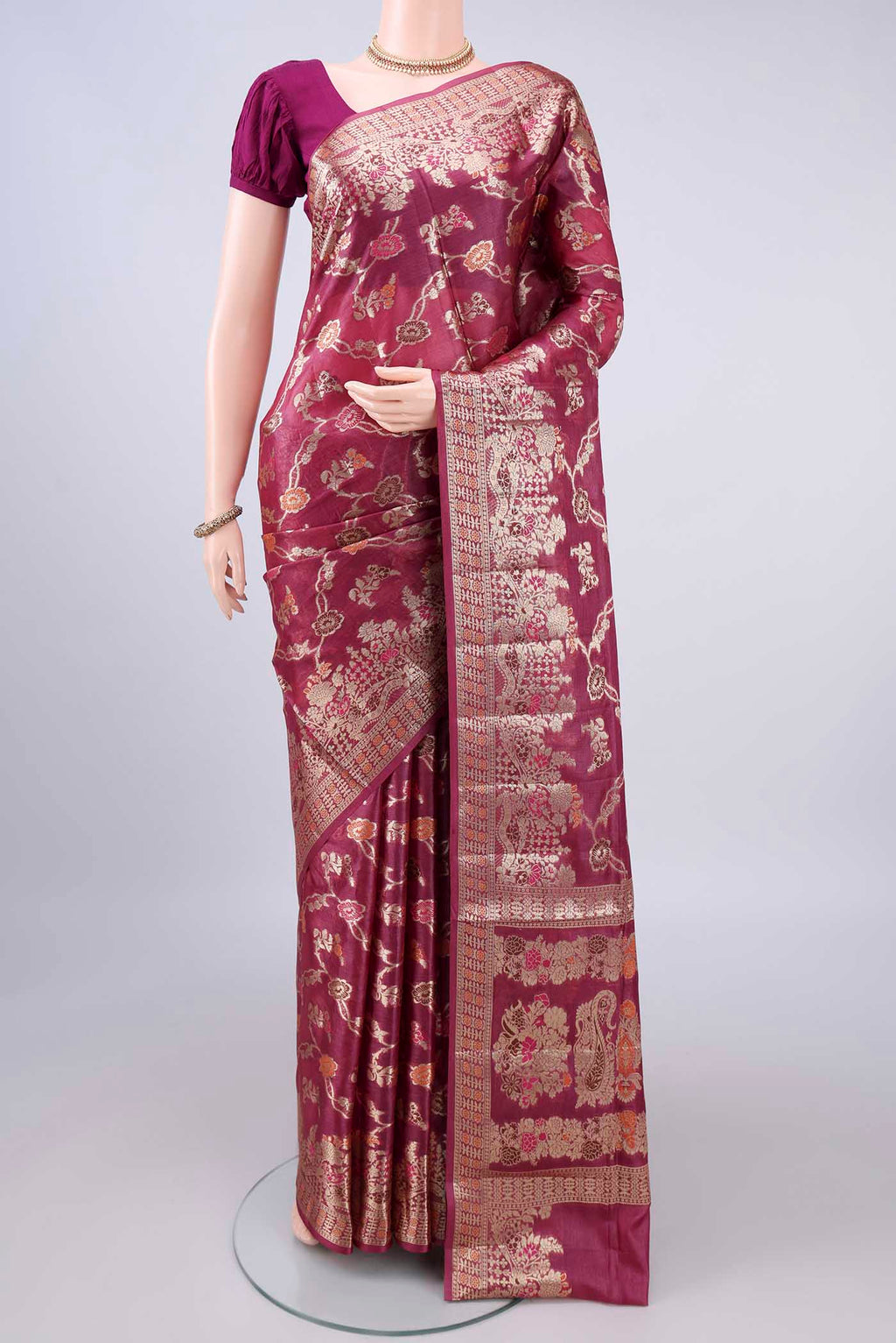 Dark Pink Banarasi Tussar Saree with Zari And Thread Butta on the body and Zari Border.  displayed on a mannequin
