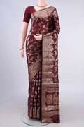 Coffee Brown Banarasi Tussar Saree with Zari And Thread Butta on the body and Zari Border.  displayed on a mannequin