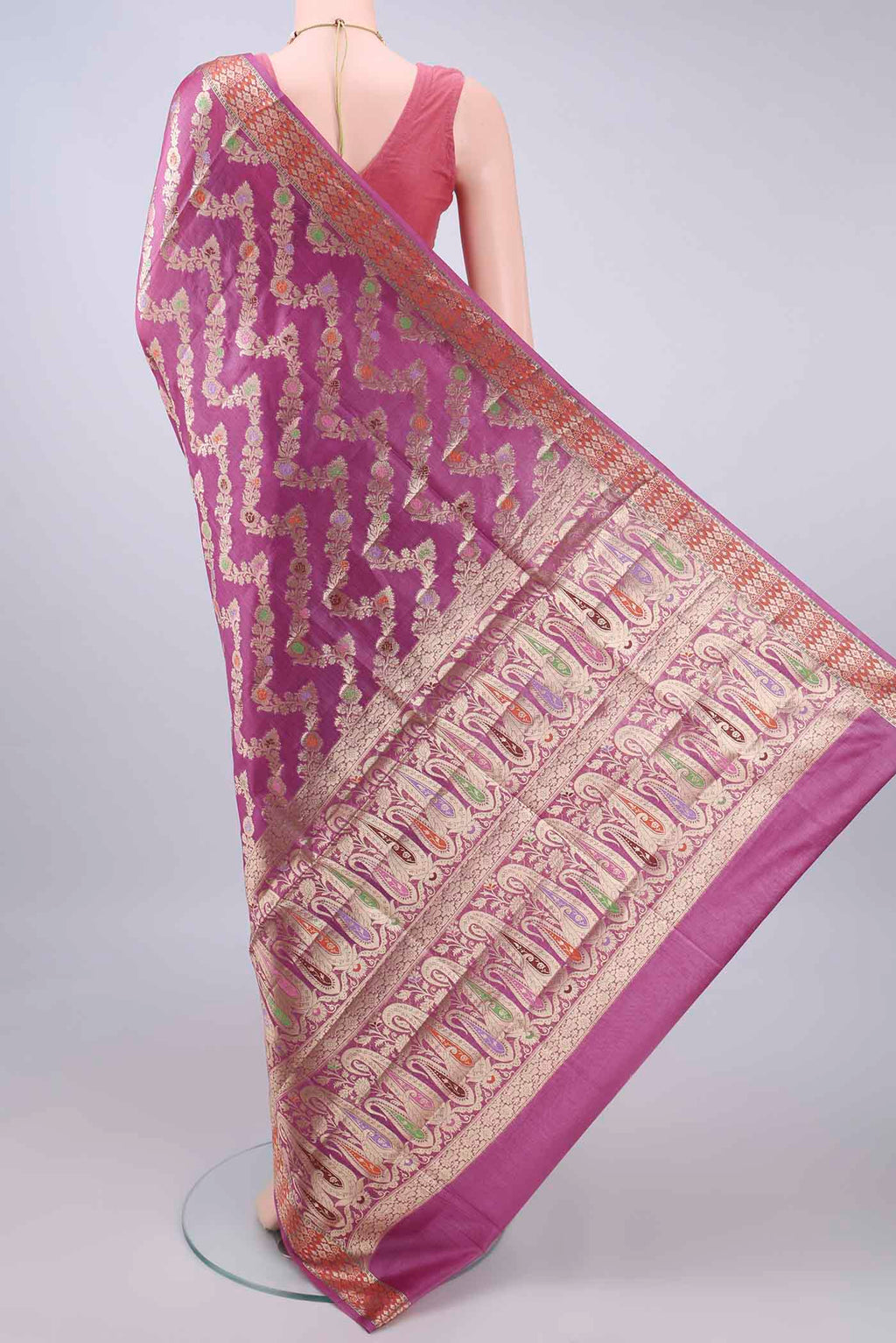 Flat view of Pink Banarasi Tussar Saree with Zari And Thread Butta on the body and Zari Border. 