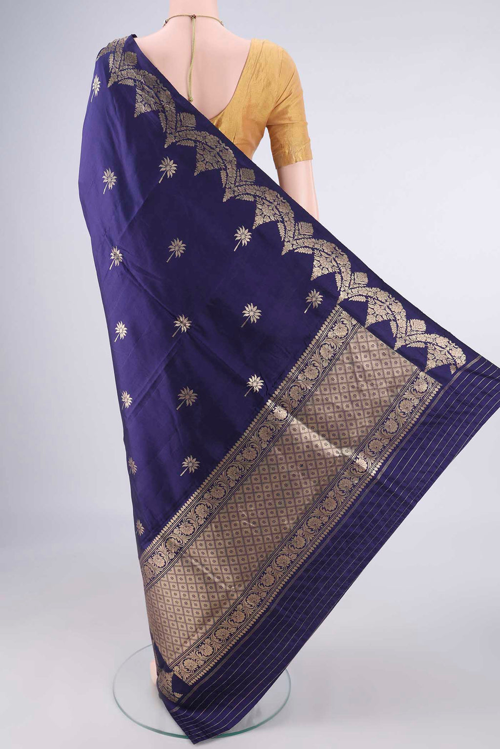 Flat view of Pure Silk Navy Blue Banarasi Katan Saree with Zari Butta on the body and Fancy Border. 