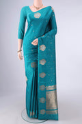 Pure Silk Sea Green Banarasi Katan Saree with Zari Butta on the body and Satin Border.  displayed on a mannequin