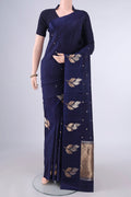 Pure Silk Navy Blue Banarasi Katan Saree with Zari Butta on the body and Satin Border.  displayed on a mannequin