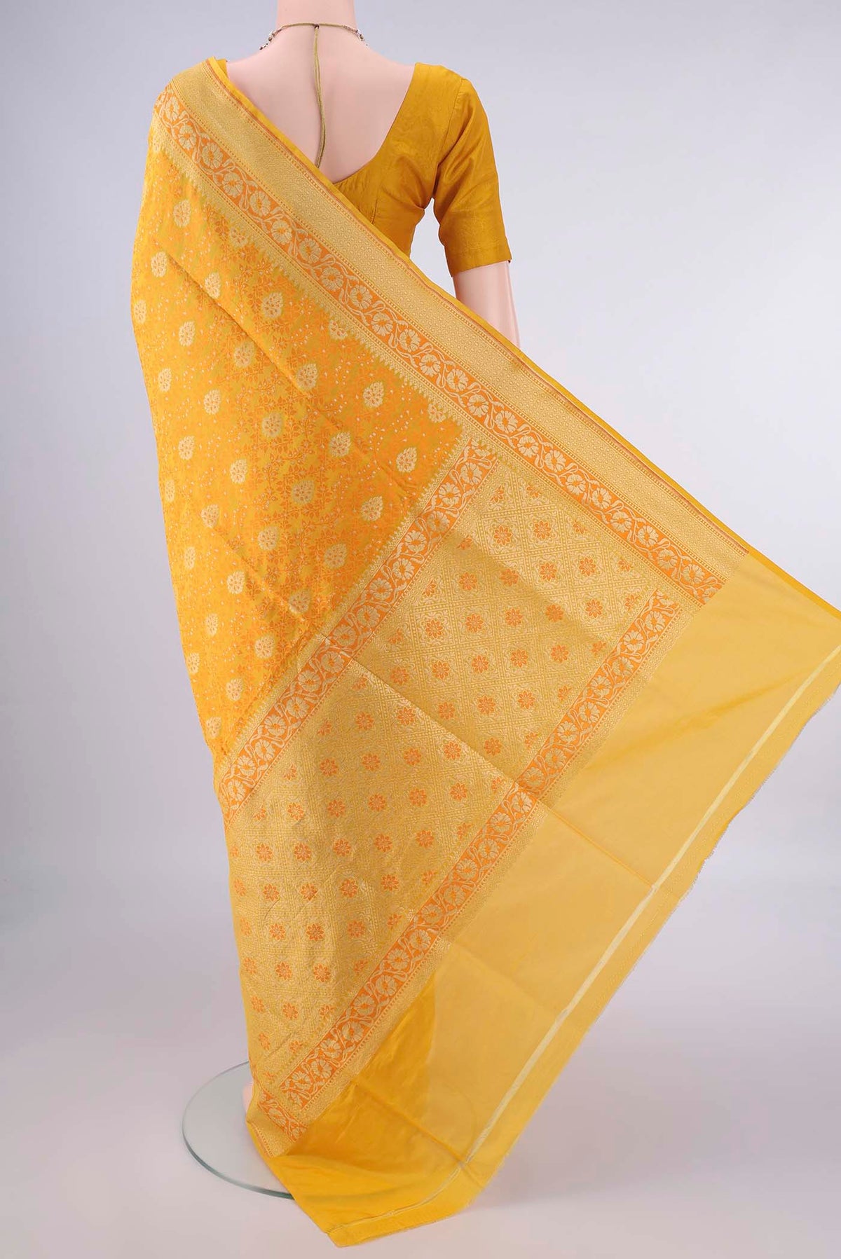 Flat view of Pure Silk Yellow Banarasi Saree with Jacquard With Thread Butta on the body and Zari And Thread Border. 