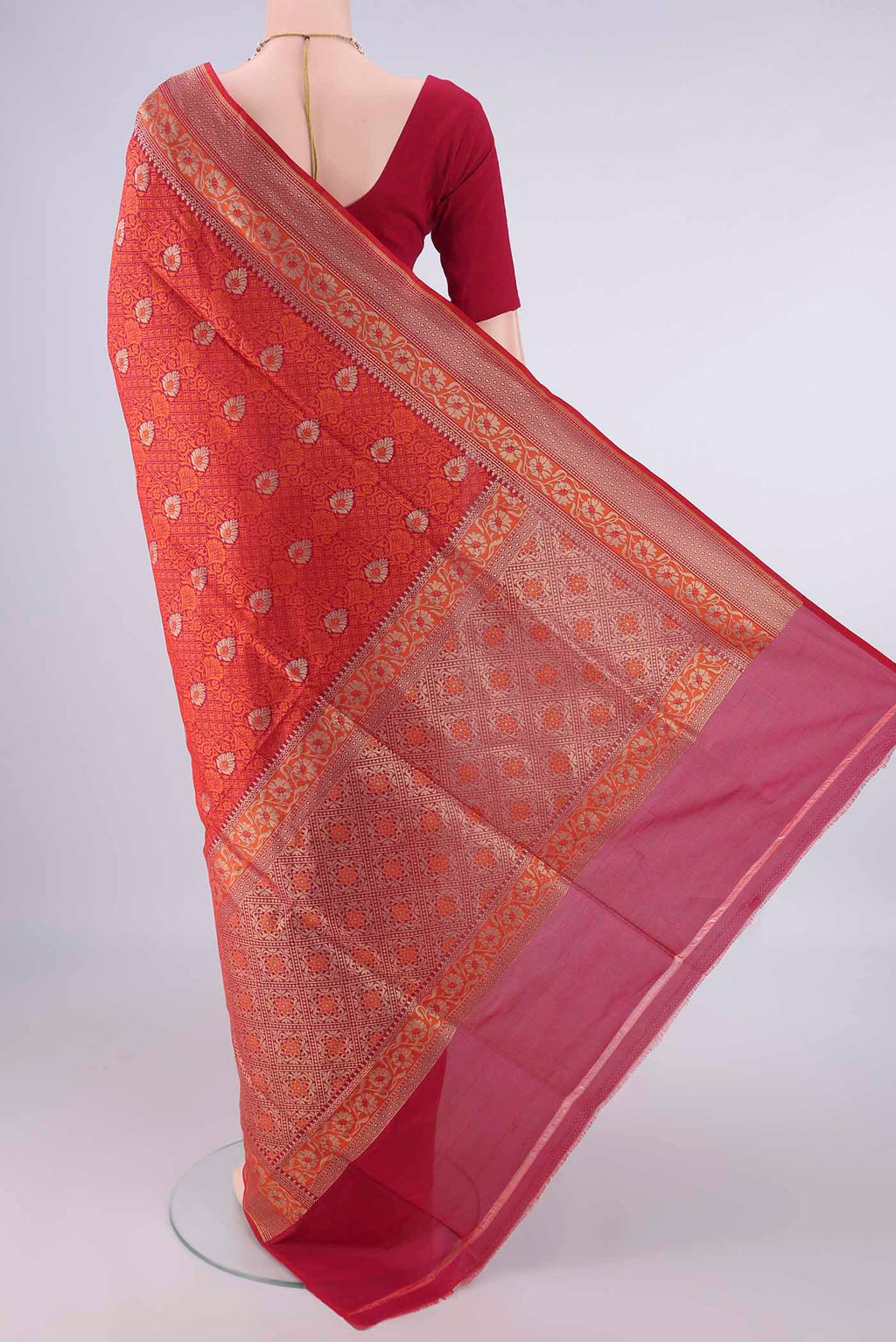 Flat view of Pure Silk Red Banarasi Saree with Jacquard With Zari Butta on the body and Zari And Thread Border. 