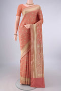 Pure Silk Peach Banarasi Saree with Jacquard With Zari Butta on the body and Zari And Thread Border.  displayed on a mannequin