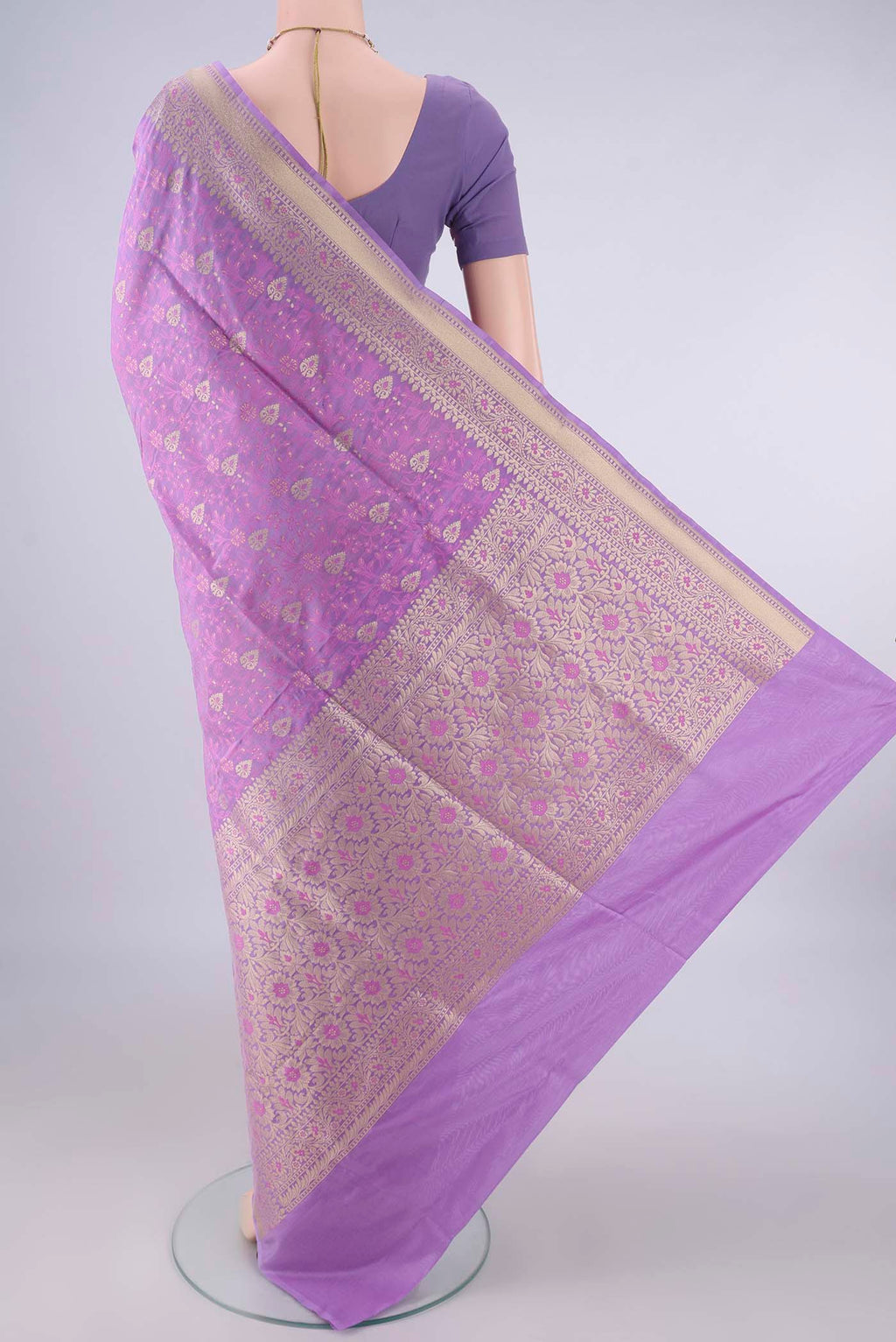 Flat view of Pure Silk Lavender Banarasi Saree with Jacquard With Zari Butta on the body and Zari And Thread Border. 