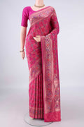 Pure Silk Rani Pink Banarasi Saree with Zari Brocade on the body and Zari Border.  displayed on a mannequin