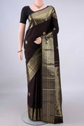 Pure Silk Coffee Brown Kanchipuram Saree with Zari Butta on the body and Zari Border.  displayed on a mannequin