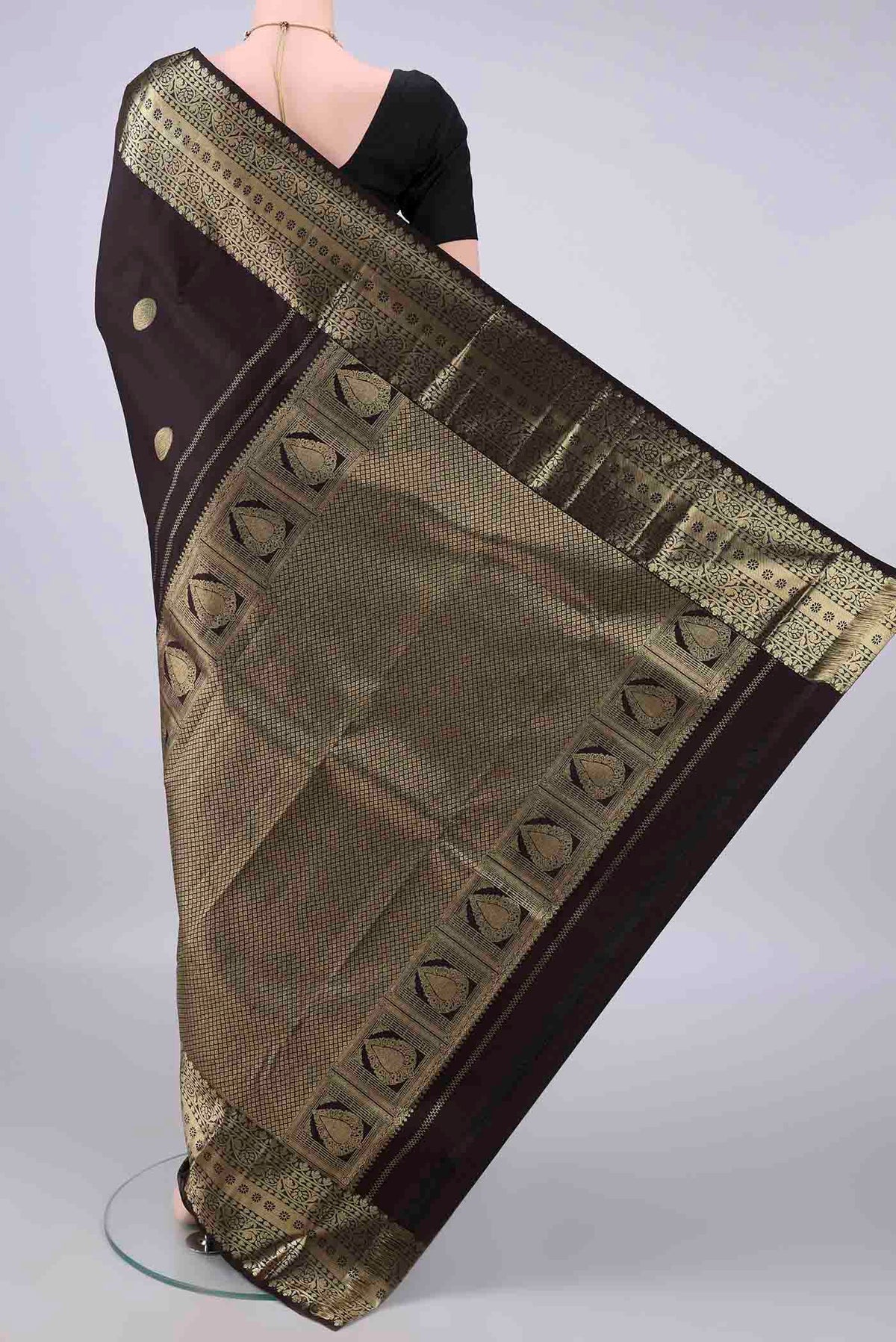 Flat view of Pure Silk Coffee Brown Kanchipuram Saree with Zari Butta on the body and Zari Border. 