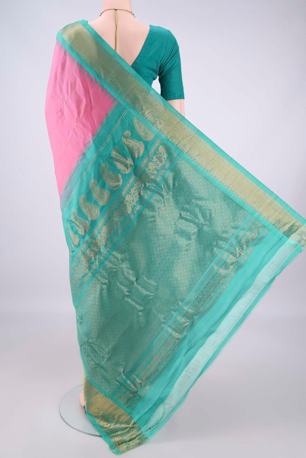Flat view of Rose pink Gadwal Cotton Saree with Zari Butta on the body and Zari Border. 