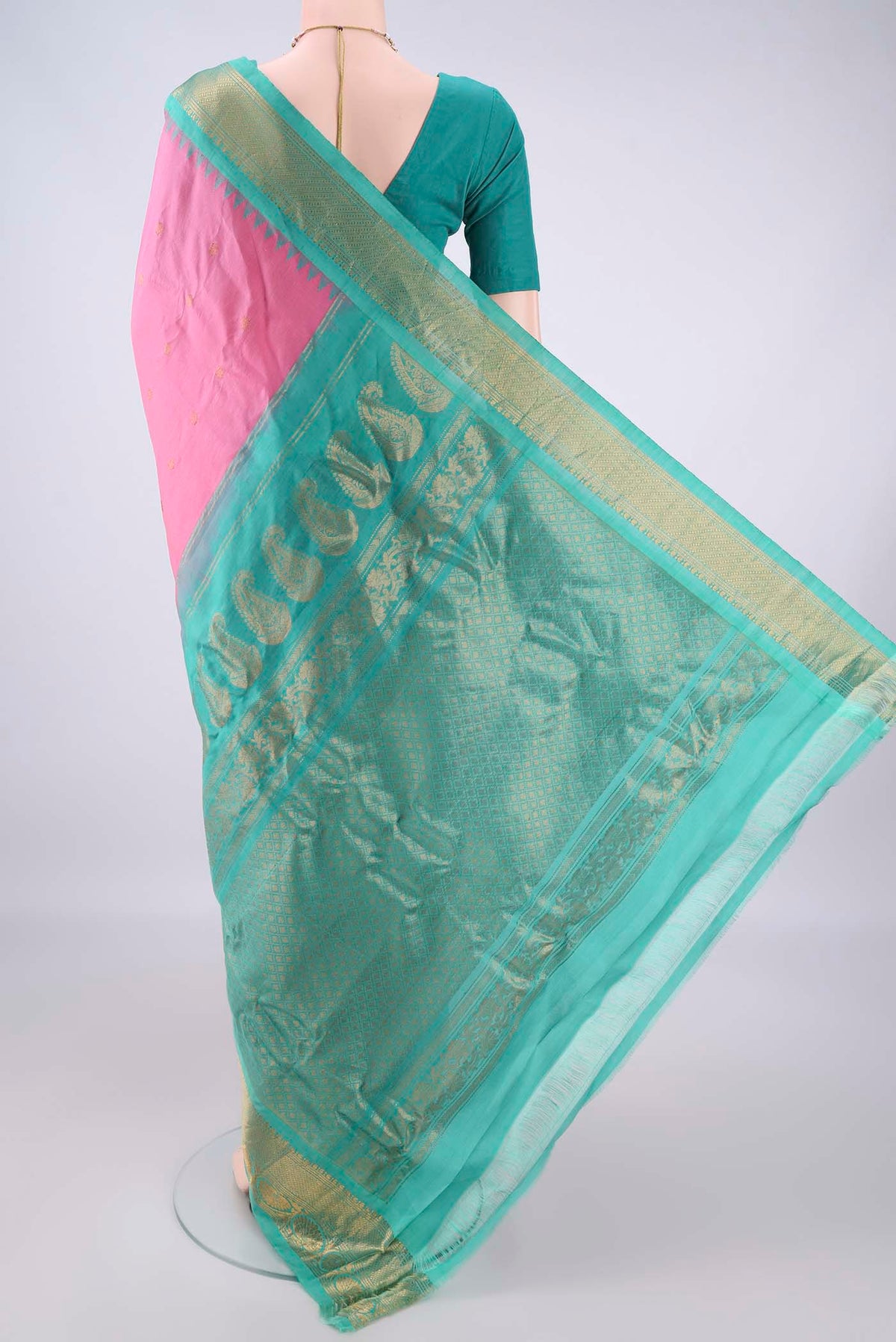 Flat view of Rose pink Gadwal Cotton Saree with Zari Butta on the body and Zari Border. 