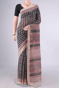 Black Maheshwari Cotton Saree with Printed design on the body and Zari Border.  displayed on a mannequin