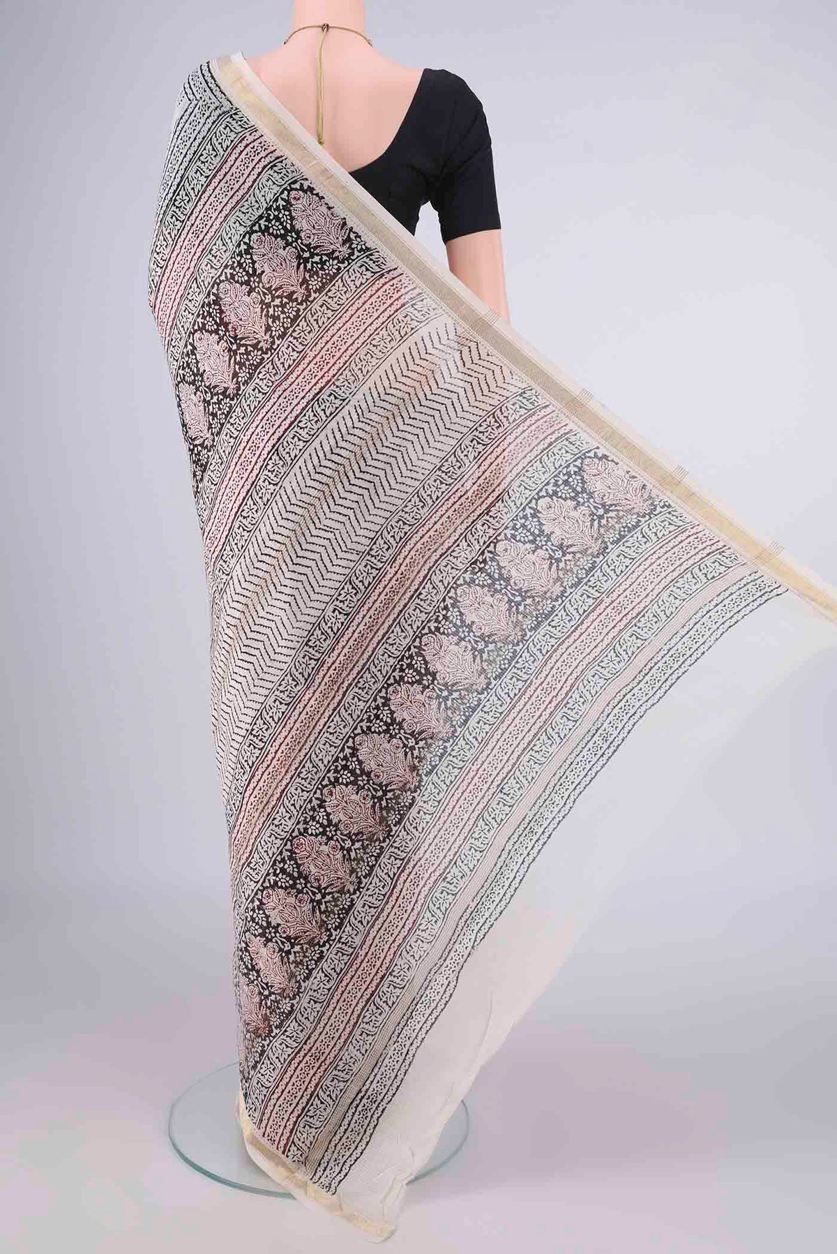 Flat view of Off White Maheshwari Cotton Saree with Printed design on the body and Zari Border. 