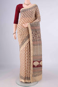 Beige Maheshwari Cotton Saree with Printed design on the body and Zari Border.  displayed on a mannequin